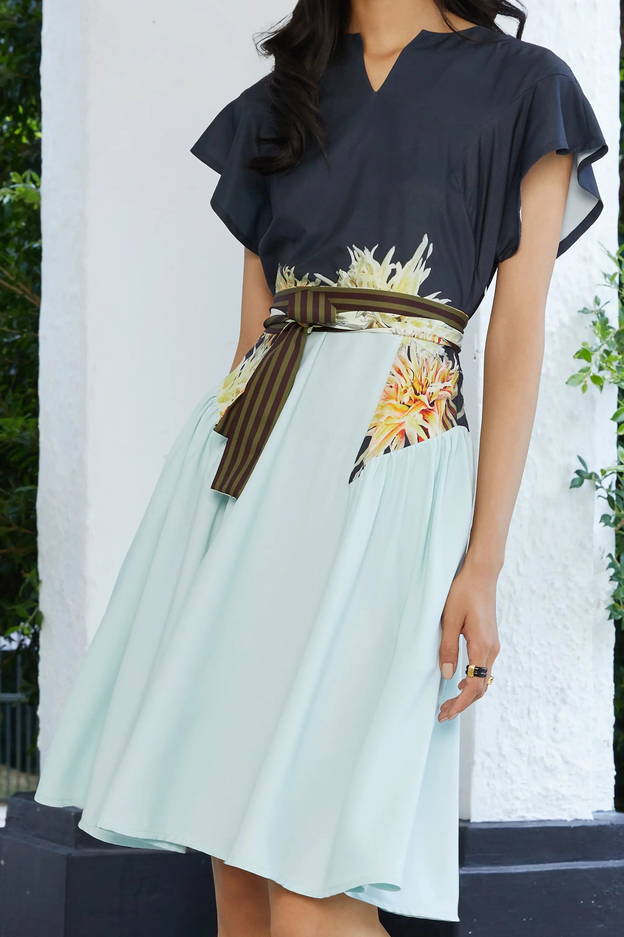 ABIDE contrast panel dress sash belt and fluid skirt drape in navy and light blue (close-up)
