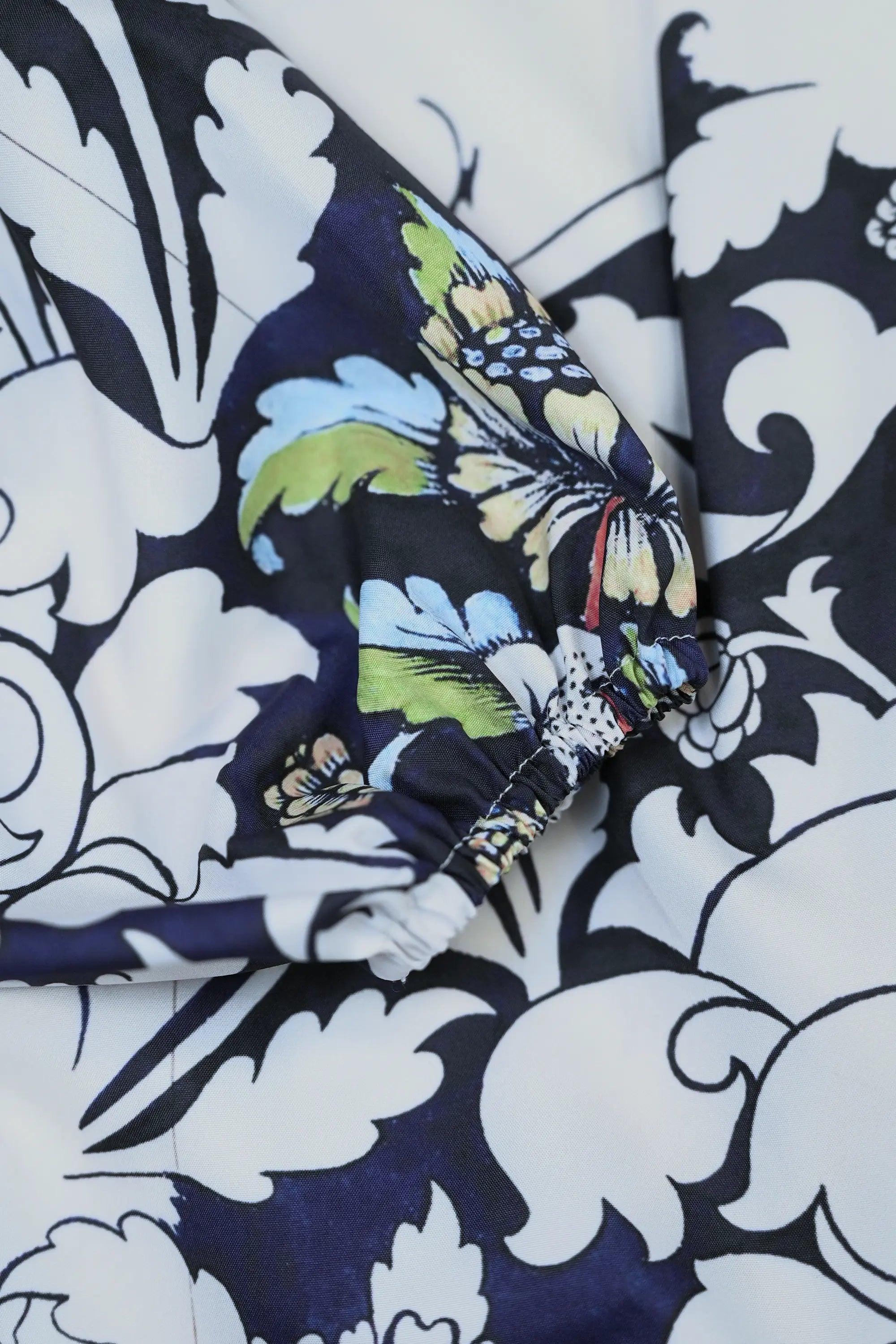 Close-up of elasticated sleeve cuff on Arrayed Peony wrap dress