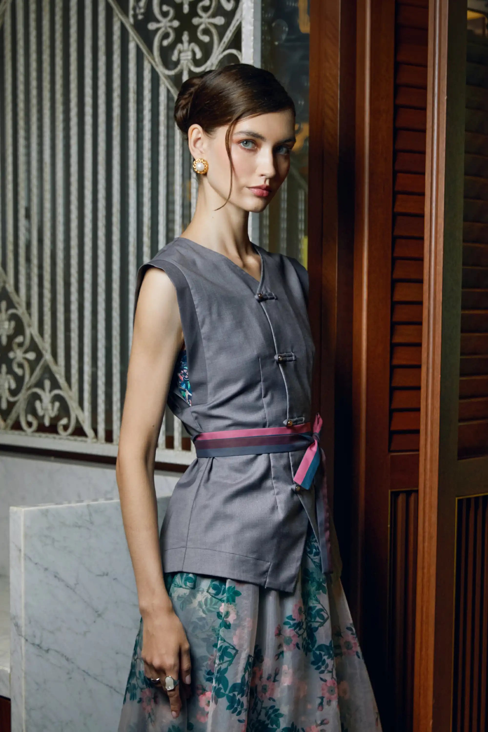 Woman wearing Arrayed grey pankou top with Blue Carnation side print detail