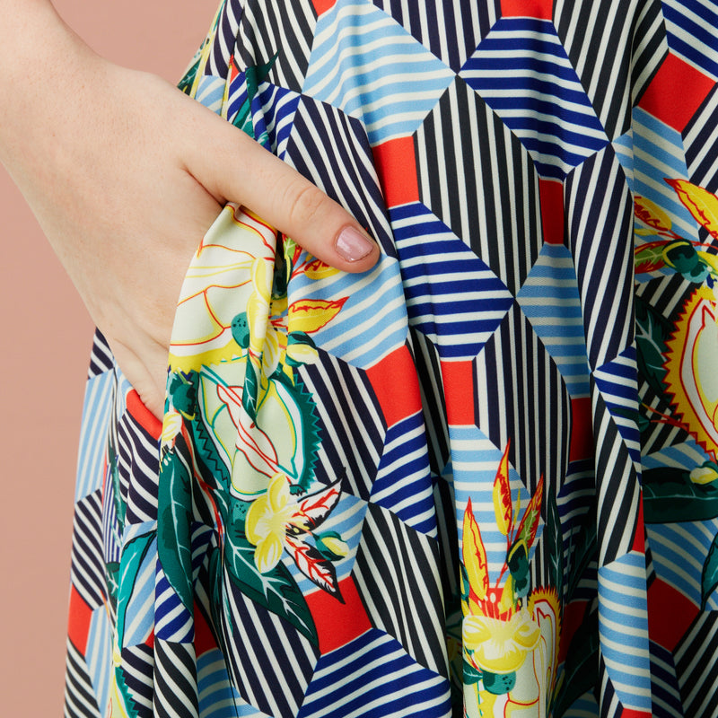 A vintage-inspired silhouette with a playful twist of bold prints and bright colours