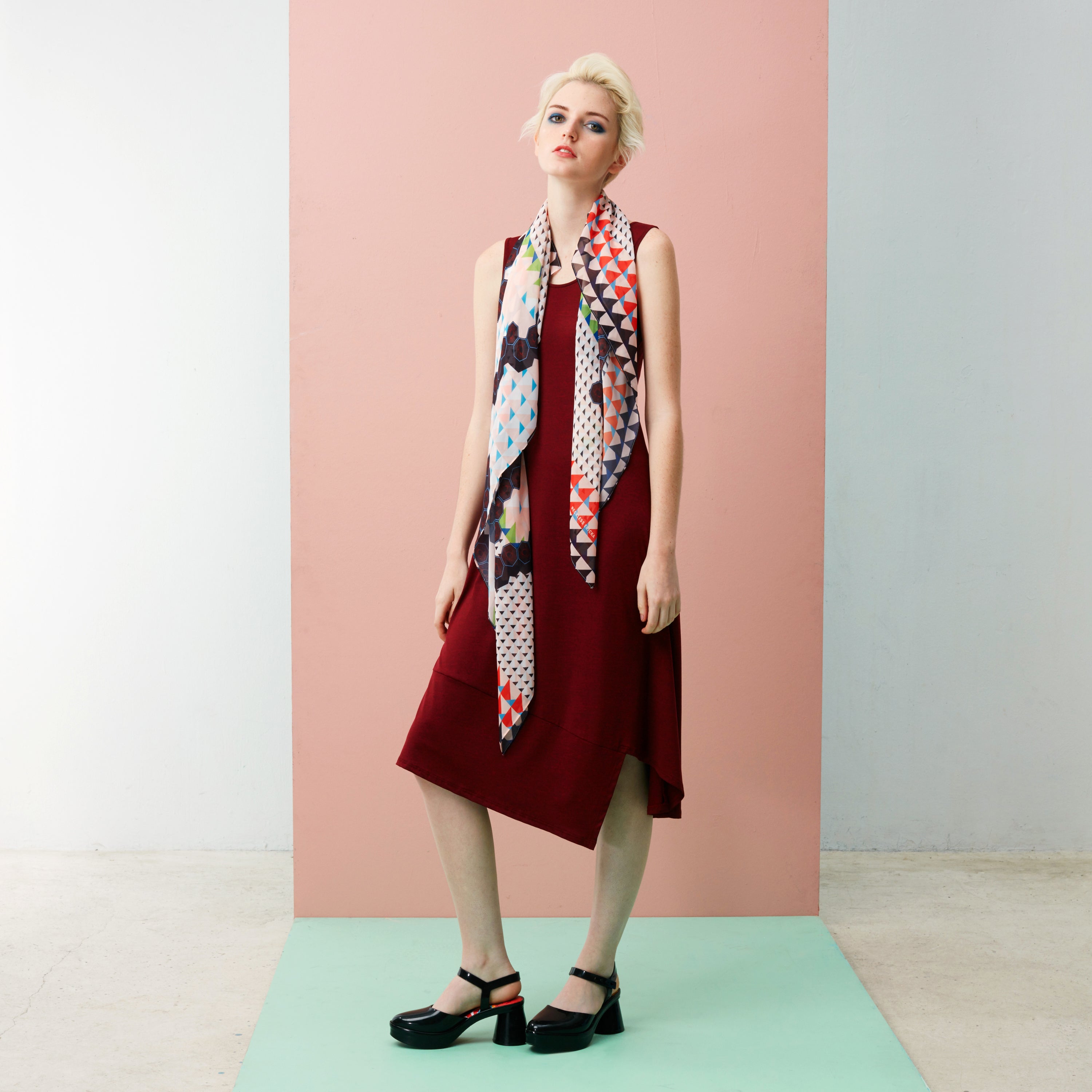 What makes the Panelled Hem Maxi Dress a wardrobe essential is its ability to anchor statement pieces and accessories. Featuring: Cream Chilli Crab Square Scarf. The Chilli Crab print is the first in Reckless Ericka’s self-owned and designed textile print