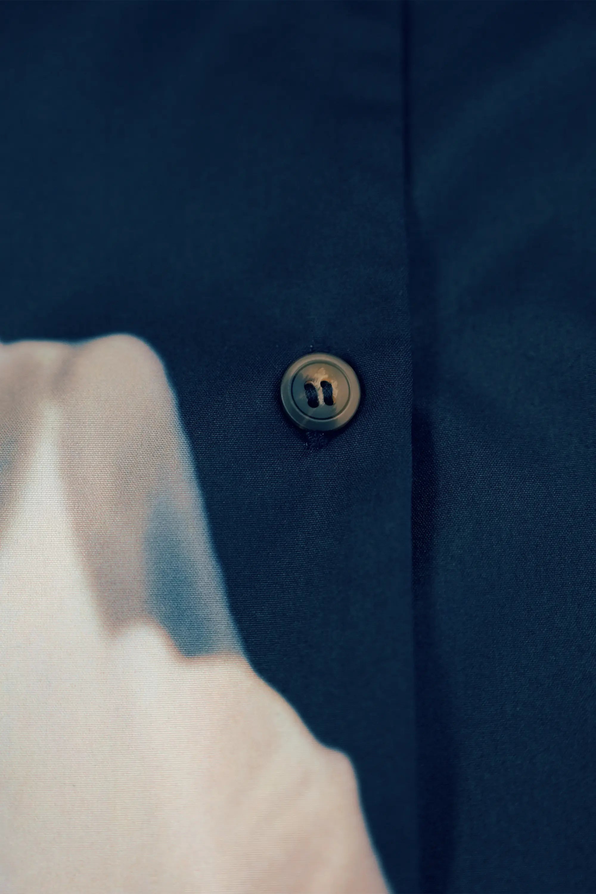 ABIDE placement print midi dress button placket detail in navy (close-up)