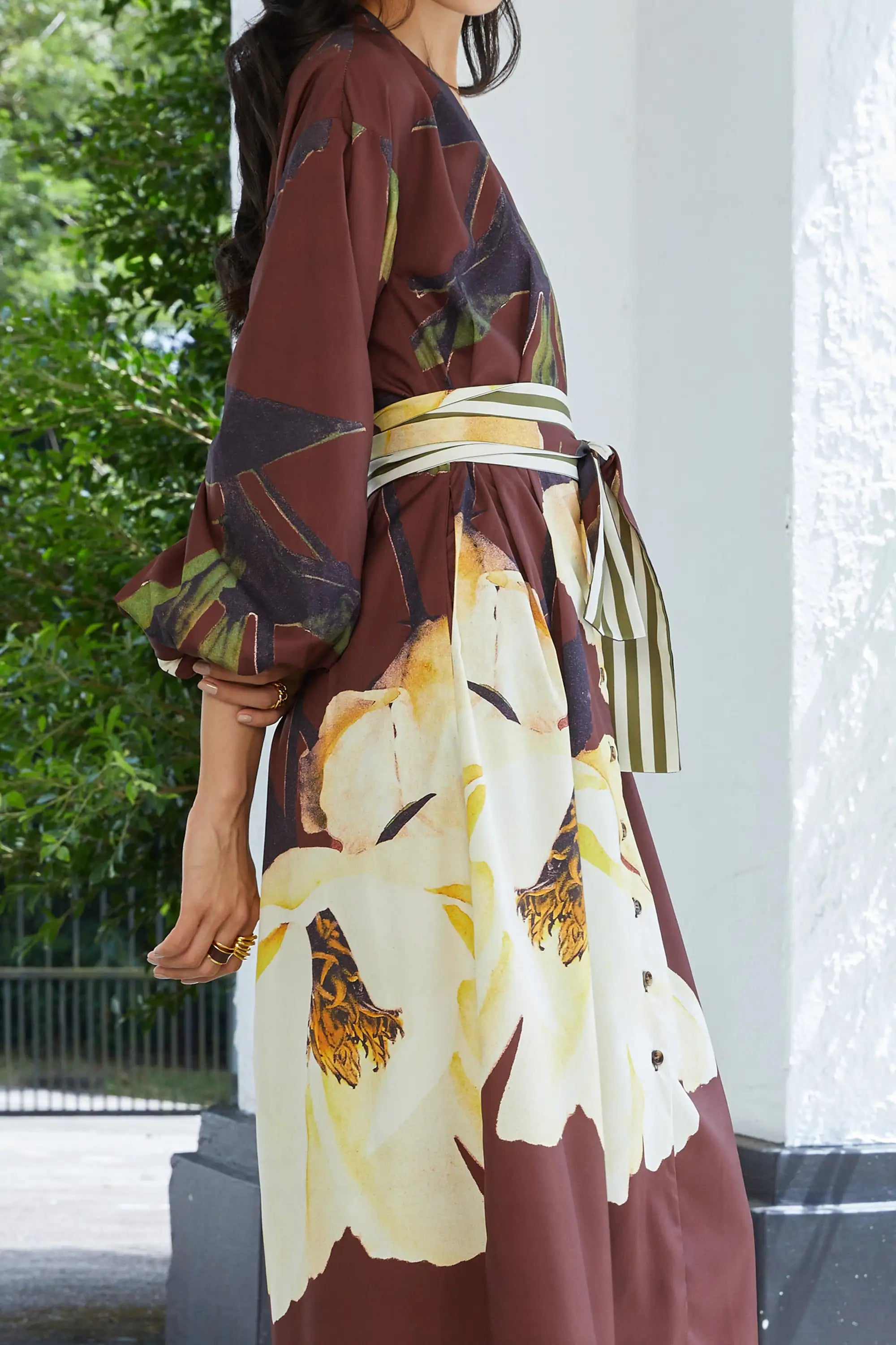 ABIDE floral dress side view with contrast sash tie and sleeve volume detail