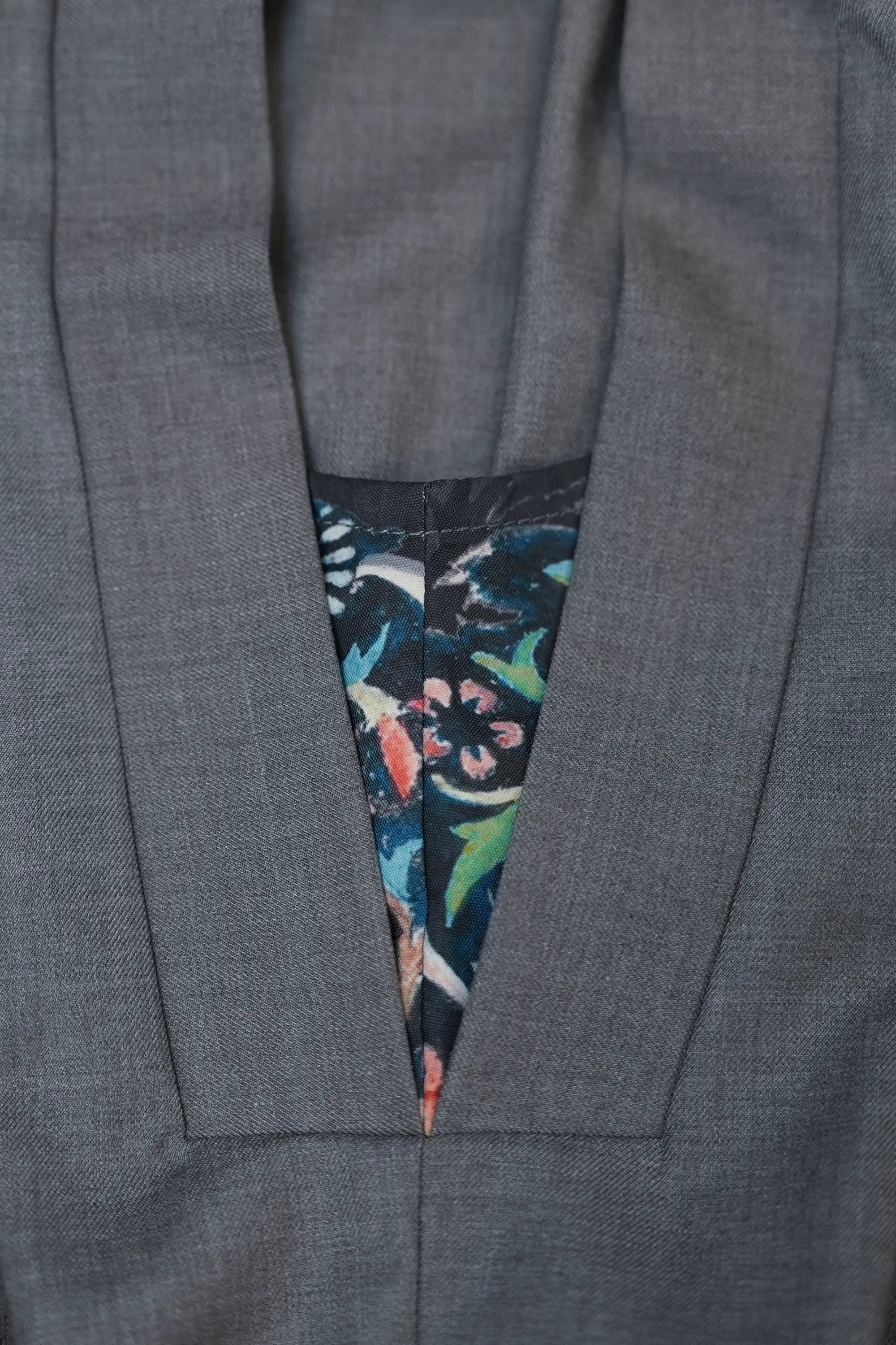 Close-up of Blue Carnation side panel on Arrayed grey pankou top