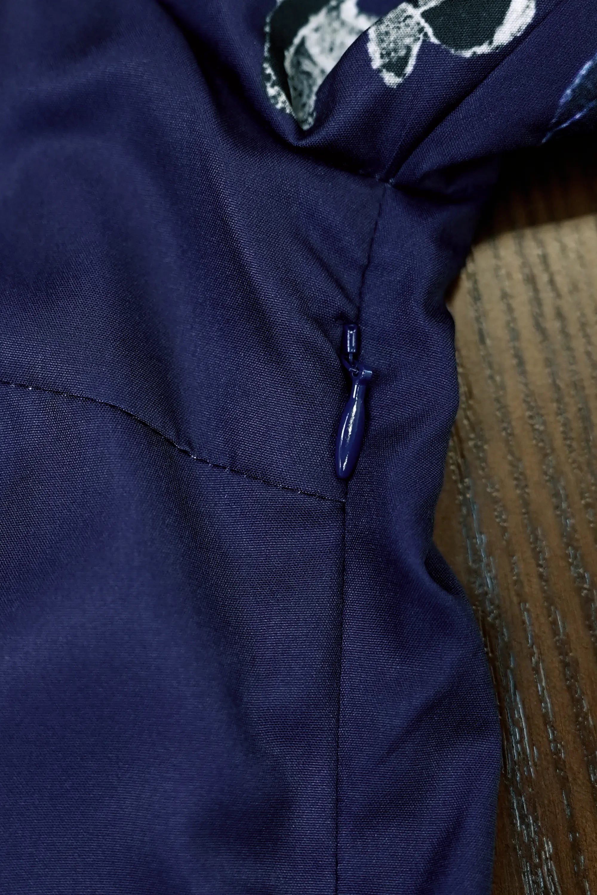 Close-up of invisible side zip on Arrayed Chrysanthemum maxi dress
