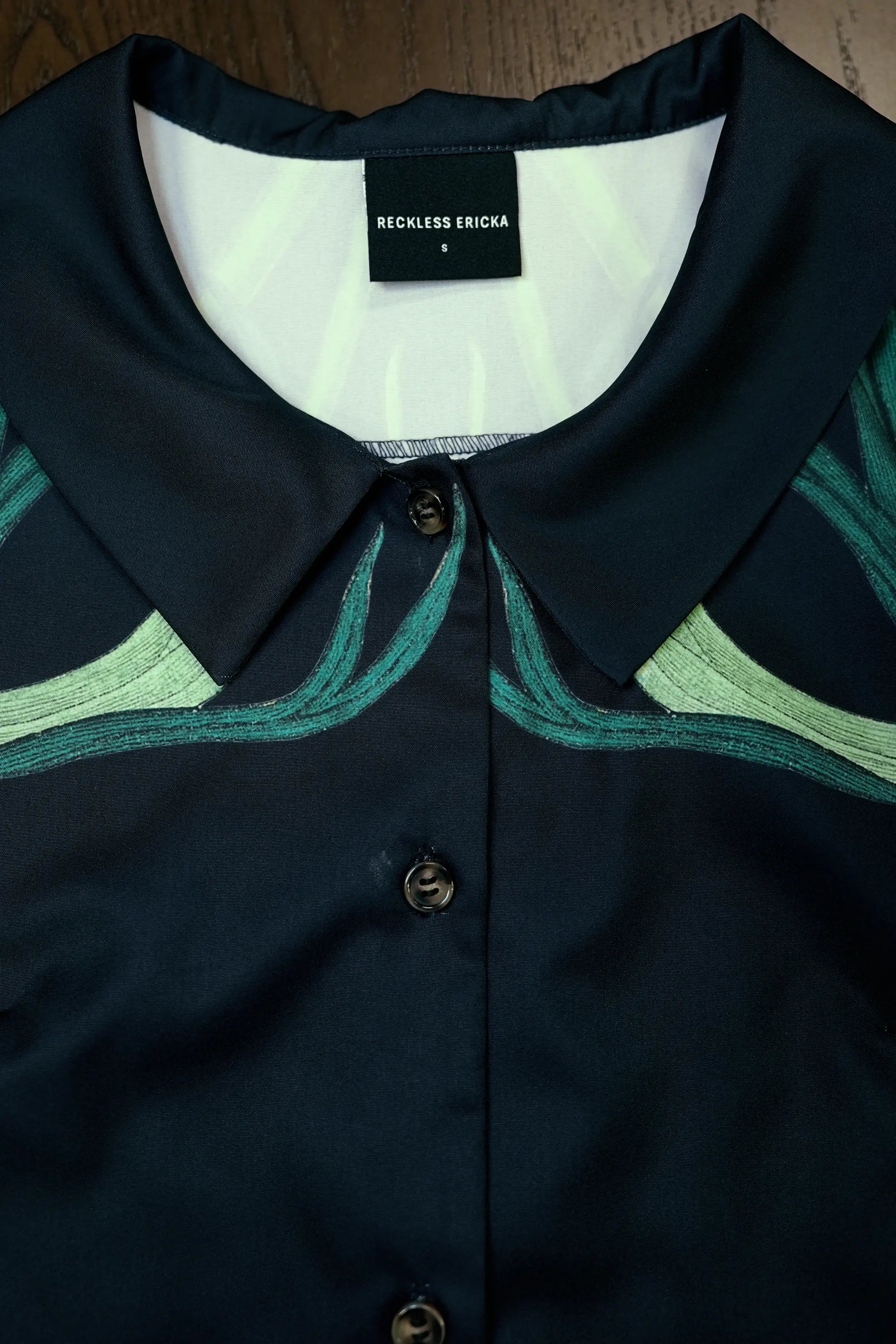 Close-up of collar on Arrayed Monk's Hood print shirt dress