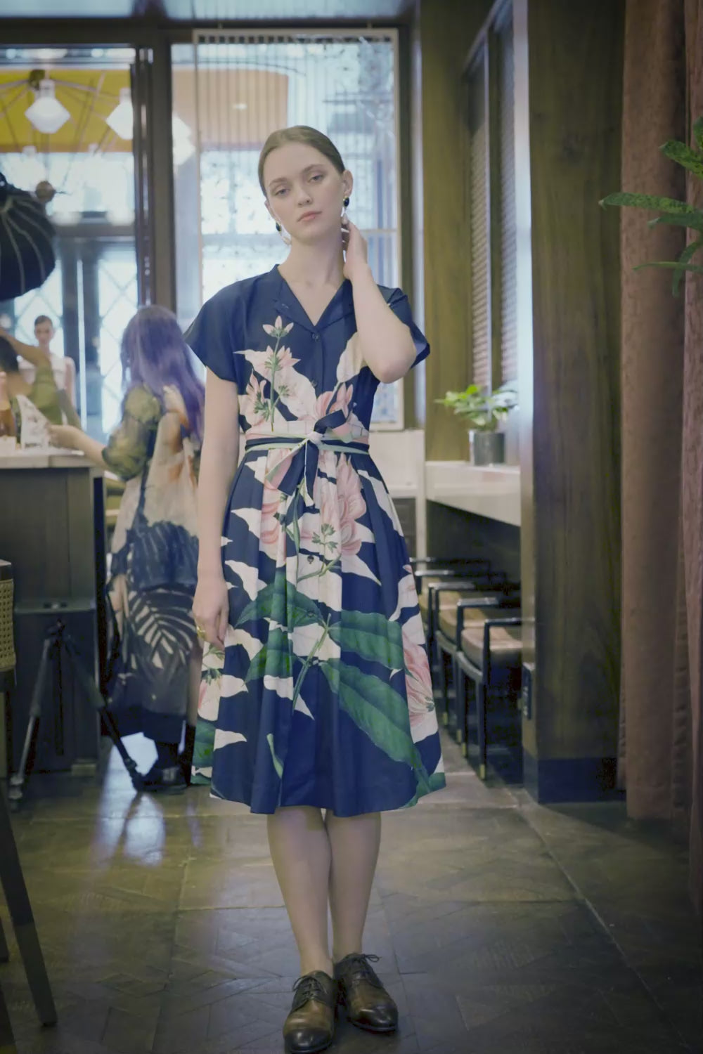 Video of Arrayed navy Geoffroya Inermis midi dress with sash and pocket details